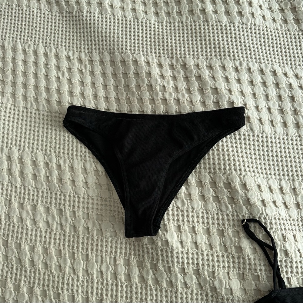 Better tan, black tan-through swimsuit, bikini bottom size xsmall